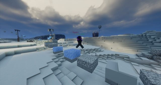 A player mid-jump on the snowy parkour course at spawn